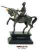 Miniature mounted knight in armor with sword