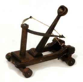 Miniature medieval catapult seige weapon