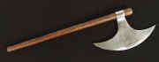 large medieval axe with wooden handle