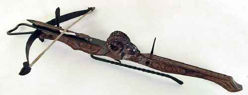 Wooden crossbow with hand carved ram's head