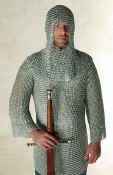Medieval knight in long sleeve maille shirt and coif