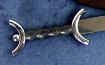 Celtic hanging sword with silver finish pommel