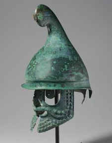 bronze helmet with green patina finish